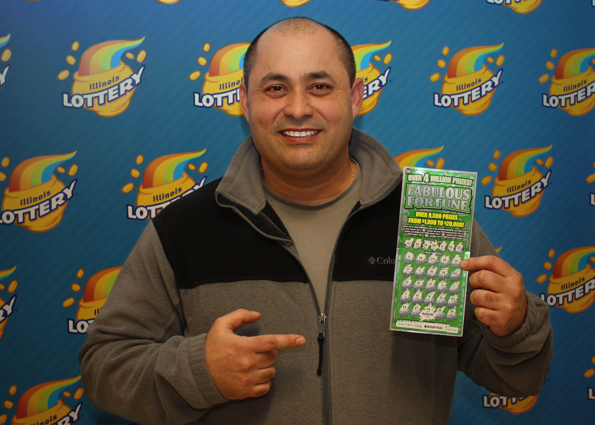 Dragun Kuznikov holds his winning Fabulous Fortune ticket.