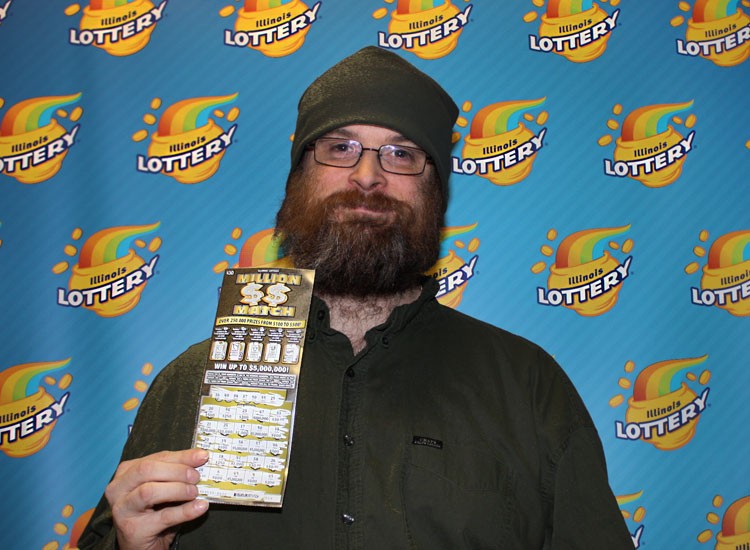Peter Stephenson holds his winning Million $$ Match ticket.​